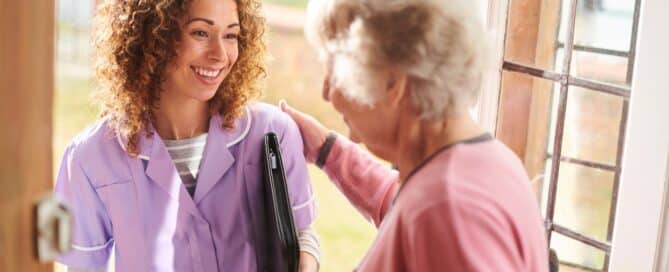 Caregiver arriving at seniors home.