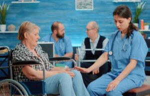 Nurse in a nursing home checking up on a senior resident.