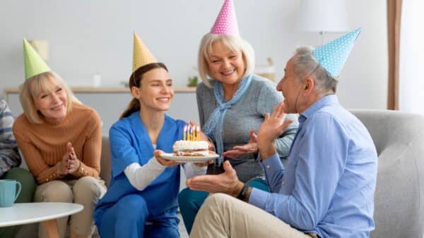 Senior resident celebrating birthday at assisted living.