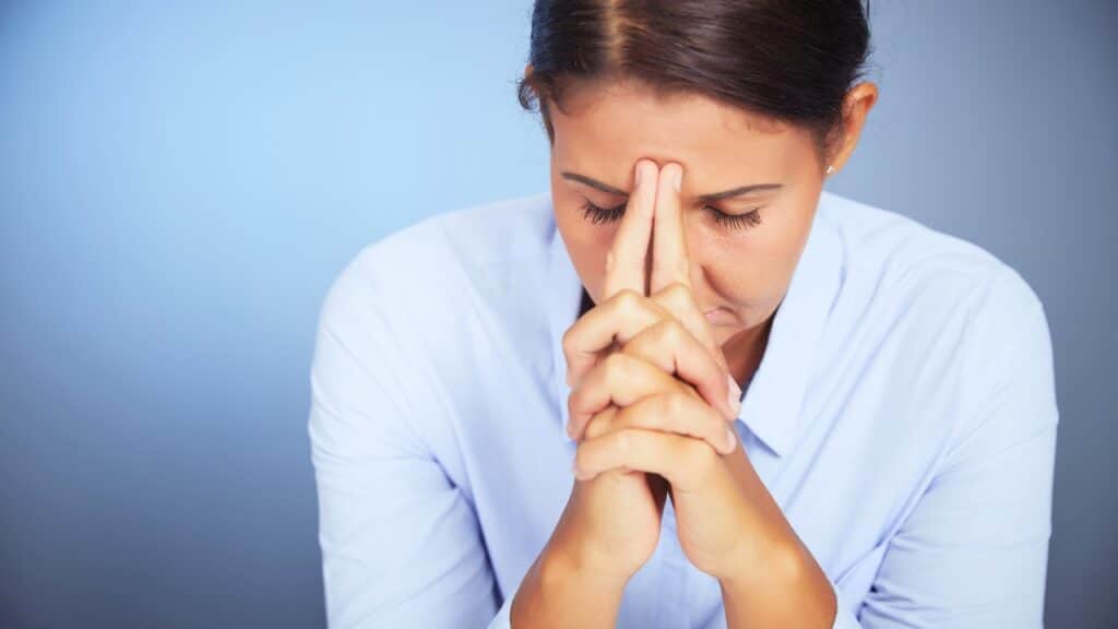 Family caregiver experiencing caregiver burden.