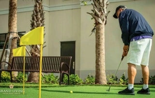 Grand Living at Lakewood Ranch Resident Playing Golf.