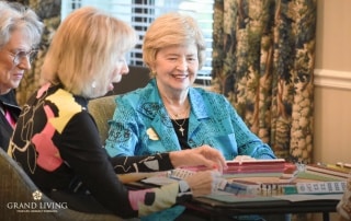 Grand Living at Lakewood Ranch Residents Playing Mahjong.