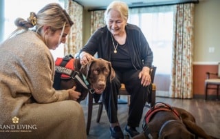 Grand Living at Wellen Park Conducting Therapy Dog Training.