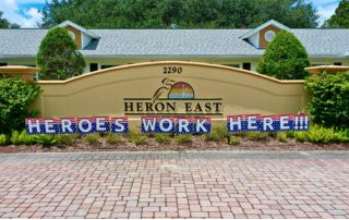 heron east front exterior with wording "heroes work here"