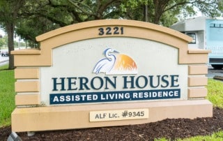 Heron House assisted living residence front sign.