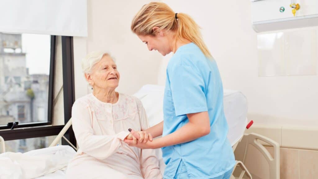 Senior with female nurse Move from Assisted Living to a Nursing Home