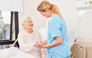 Senior with female nurse Move from Assisted Living to a Nursing Home