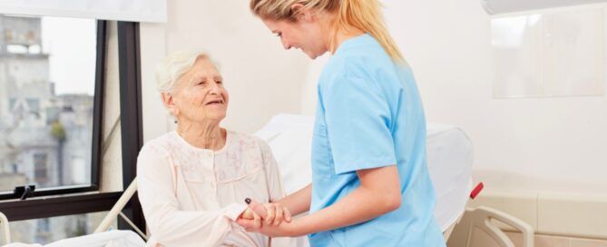 Senior with female nurse Move from Assisted Living to a Nursing Home