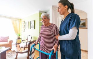 Assisted living tour with senior and caregiver.