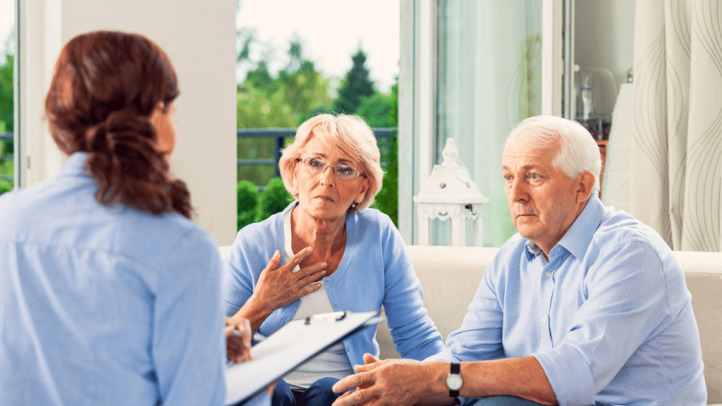 Senior couple meet with senior care advisor for assisted living cost guidance.