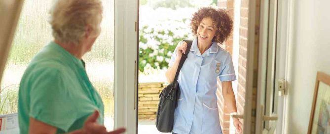 Home health aide providing respite care to a senior.