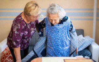 Caregiver assisting a senior with Activities of Daily Living