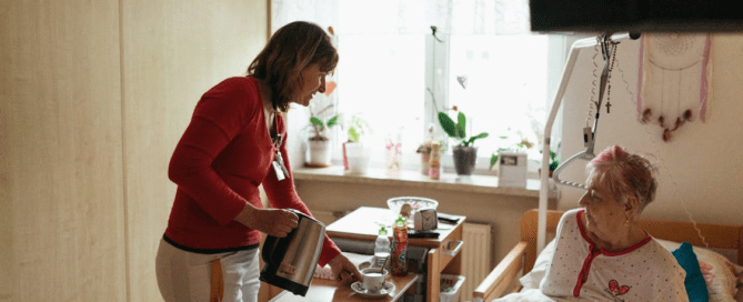A caregiver serving an elderly