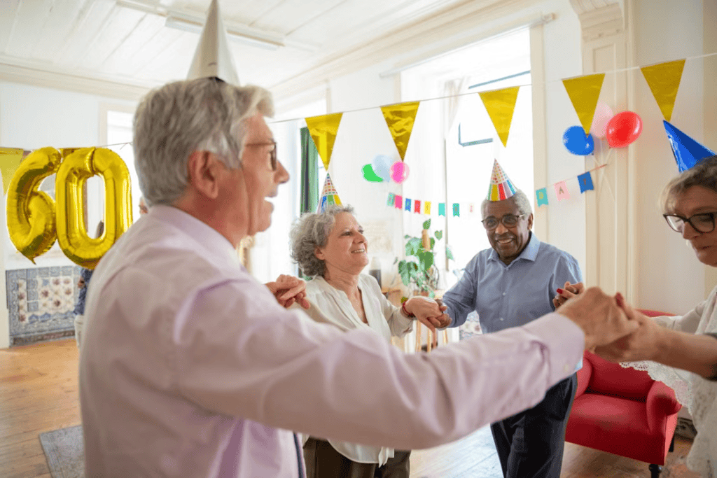 Elderly people having a party in an assisted living facility 
